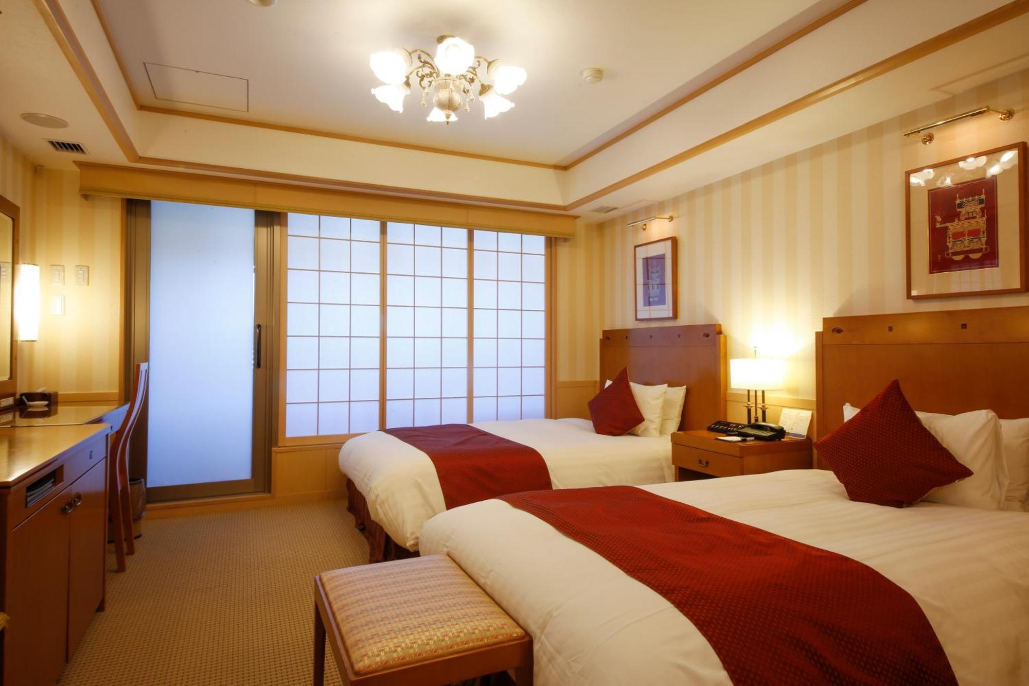 فندق تاكاياما جرين المظهر الخارجي الصورة A room at the hotel
